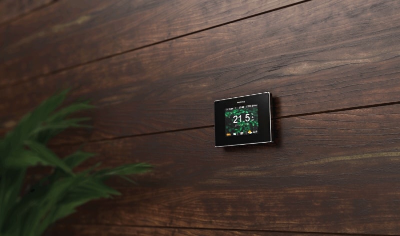 4ie underfloor heating thermostat control installed on wooden wall